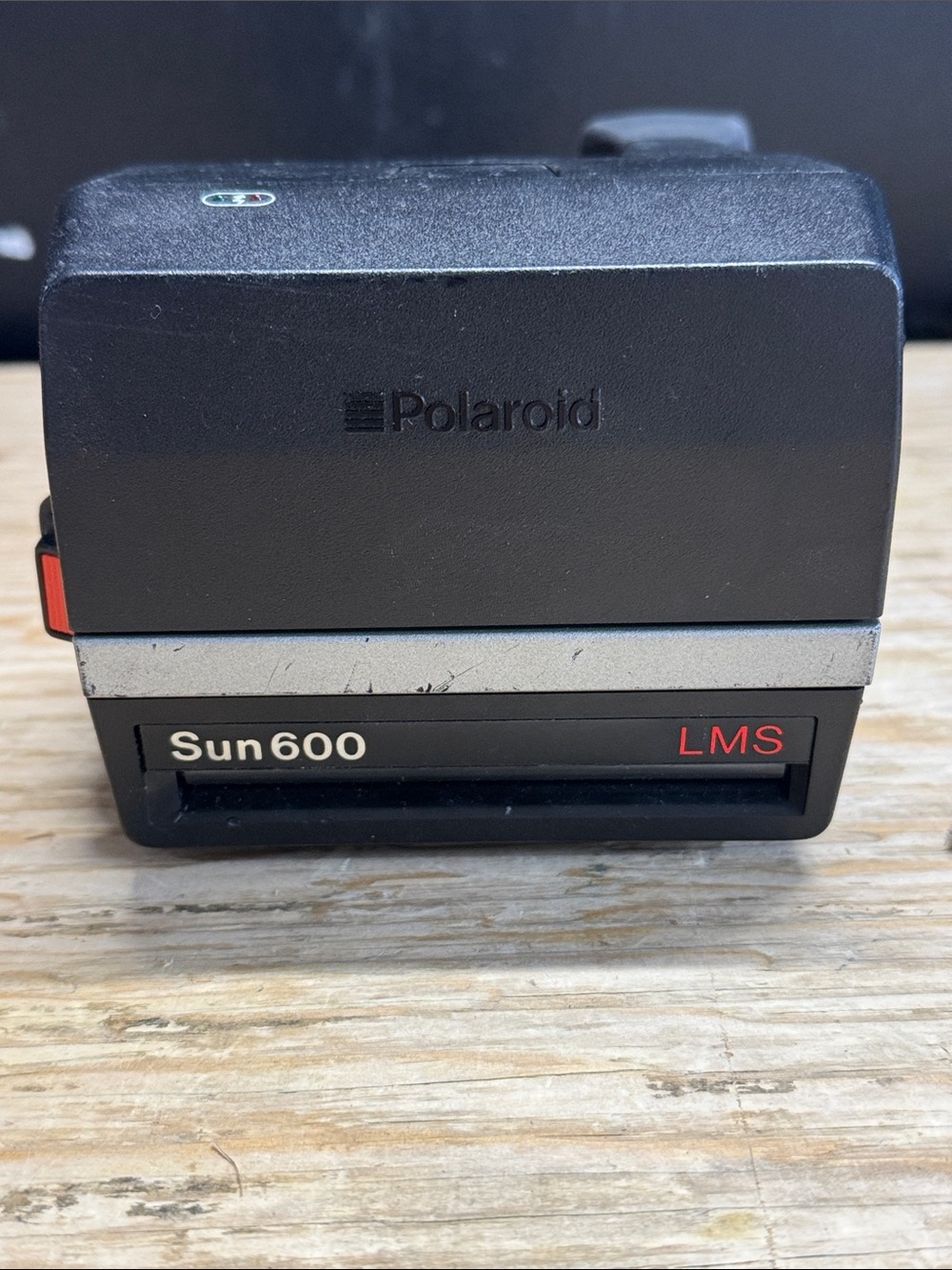 Polaroid Sun 600 LMS Instant Camera in Black with Red Accents